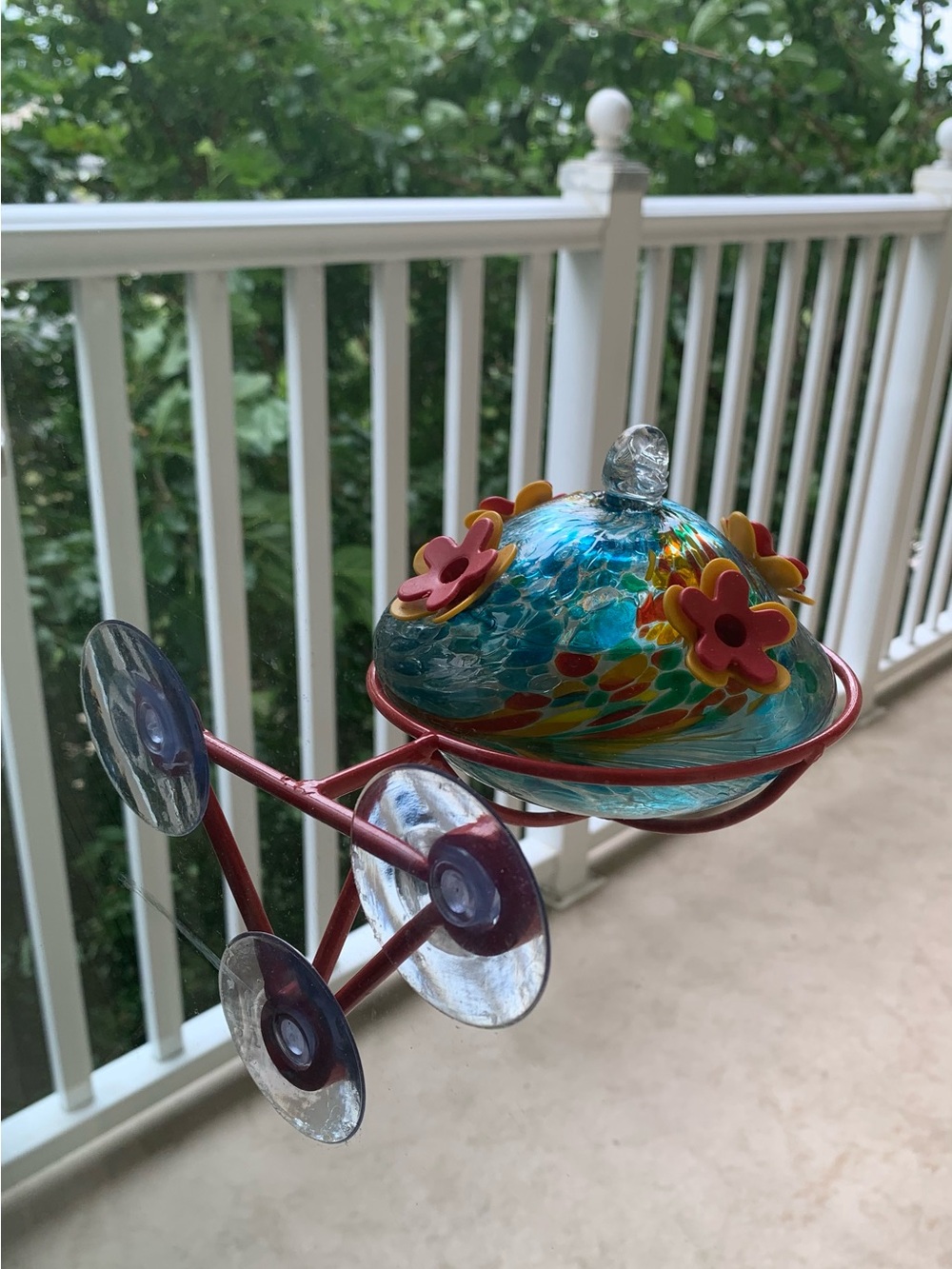 Pretty multicolored Glass Hummingbird Feeder with